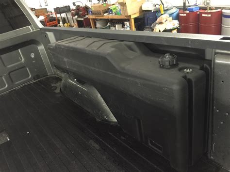 The auxiliary tank keeps the factory tank full. . Under bed auxiliary fuel tanks for pickup trucks